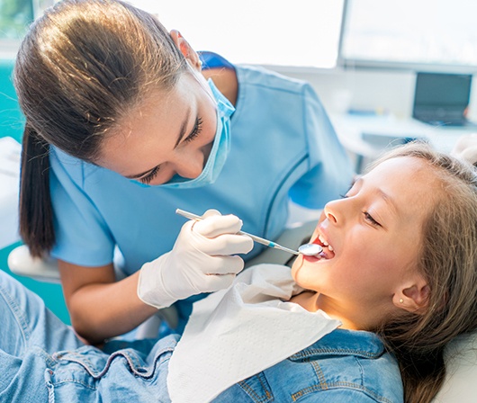 young girl having airway checked