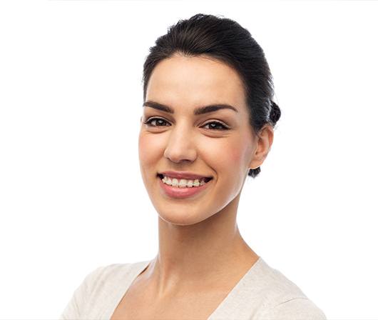 woman in white with ceramic braces