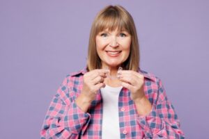 Older woman with Invisalign